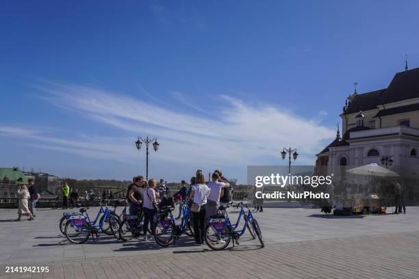 People are using Warsaw City's public Veturilo bicycles in Warsaw, Poland, on March 30, 2024.