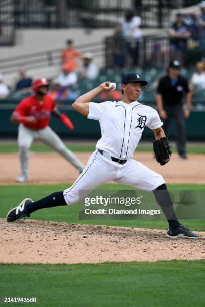 Wilmer Flores of the Detroit Tigers throws a pitch during the ninth inning of a spring training Spring Breakout game against the Philadelphia...
