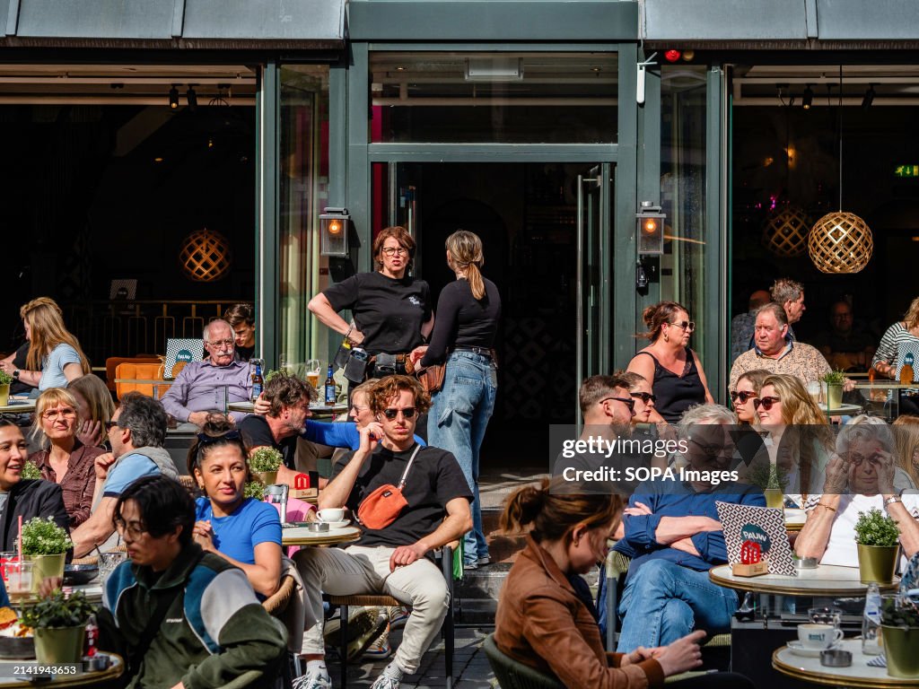 Terraces are seen full of people enjoying the good weather...