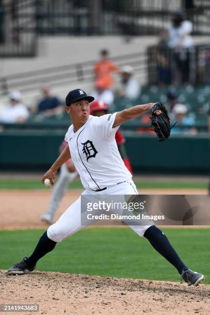 Wilmer Flores of the Detroit Tigers throws a pitch during the ninth inning of a spring training Spring Breakout game against the Philadelphia...