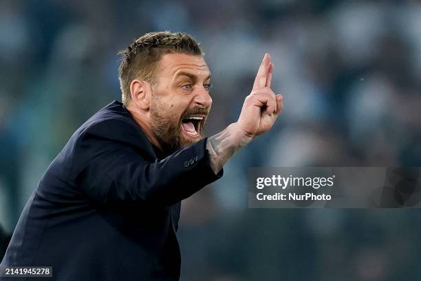 Daniele De Rossi head coach of AS Roma gestures during the Serie A TIM match between AS Roma and SS Lazio at Stadio Olimpico on April 06, 2024 in...