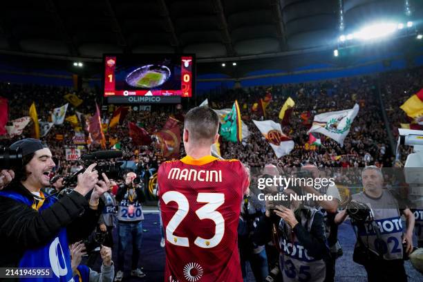 Gianluca Mancini of AS Roma celebrates the victory with AS Roma supporters during the Serie A TIM match between AS Roma and SS Lazio at Stadio...