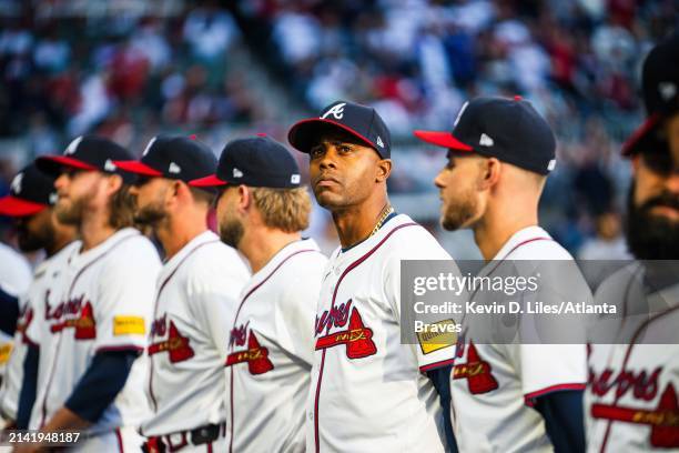Raisel Iglesias of the Atlanta Braves stands during introductions before the game against the Arizona Diamondbacks at Truist Park on April 5, 2024 in...