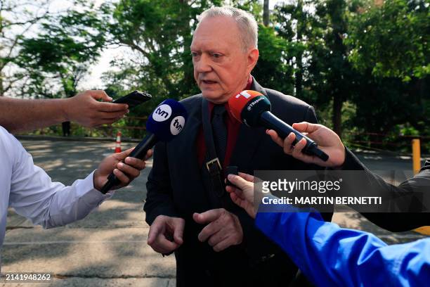 Lawyer and one of the main defendants in the Panama Paper case, Jurguen Mossack, speaks to reporters upon his arrival at the court of justice in...