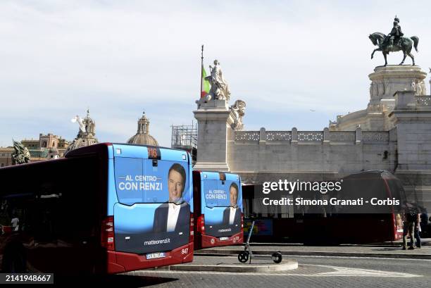 Election advertising by Matteo Renzi, leader of Italia Viva, with the slogan "at the Center with Renzi" on the buses in Piazza Venezia in relation to...