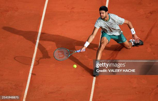 Russia's Karen Khachanov plays a forehand return to Britain's Cameron Norrie during their Monte Carlo ATP Masters Series Tournament round of 64...