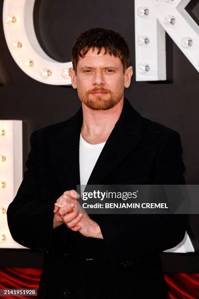 British actor Jack O'Connell poses on the red carpet upon arrival to attend the World Premiere of the film "Back To Black", in central London, on...