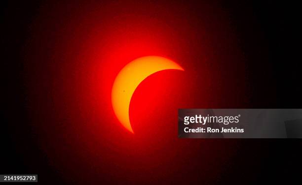 The moon eclipses the sun on April 8, 2024 in Fort Worth, Texas. Millions of people have flocked to areas across North America that are in the "path...