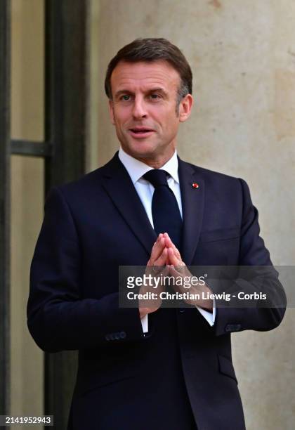 France's President Emmanuel Macron welcomes Serbia's President Aleksandar Vucic upon his arrival at Elysee Palace on April 8, 2024 in Paris, France....