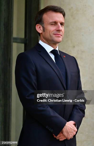 France's President Emmanuel Macron welcomes Serbia's President Aleksandar Vucic upon his arrival at Elysee Palace on April 8, 2024 in Paris, France....