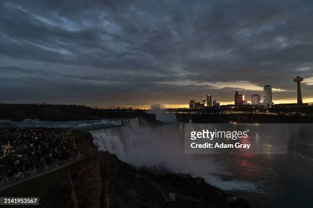 People gather to watch totality during the Solar Eclipse on April 8, 2024 in Niagara Falls, New York. Millions of people have flocked to areas across...