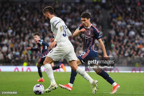 Gio Reyna of Nottingham Forest puts pressure on Rodrigo Bentancur of Tottenham Hotspur during the Premier League match between Tottenham Hotspur and...