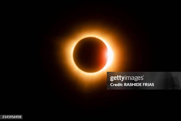 View of a total solar eclipse seen from Mazatlan, Sinaloa state, Mexico on April 8, 2024. This year's path of totality is 115 miles wide and home to...