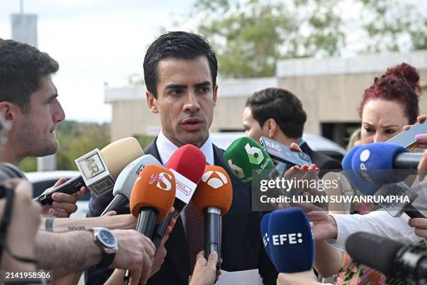 Juan Gonzalo Ospina, lawyer to the family of Colombian plastic surgeon Edwin Arrieta Arteaga, speaks to media before attending the witness...