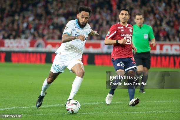 Pierre-Emerick Aubameyang of Marseille, Benjamin Andre of Lille in action during the Ligue 1 Uber Eats match between Lille OSC and Olympique de...