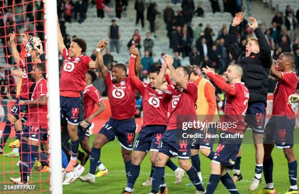 Players of Lille celebrate the victory following the Ligue 1 Uber Eats match between Lille OSC and Olympique de Marseille at Stade Pierre-Mauroy,...