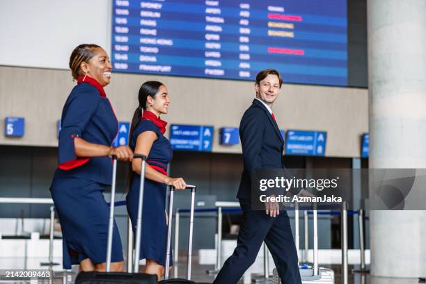 air crew ending their shift at the airport - crew stock pictures, royalty-free photos & images