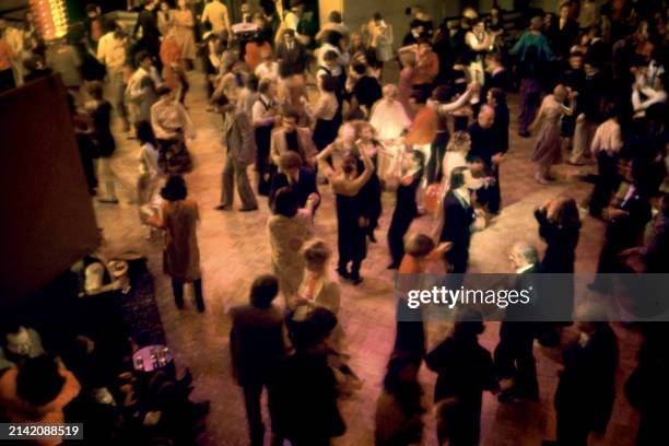 An above angle of the people dancing at the Manhattan nightclub and disco Studio 54 in New York, New York, circa 1979.