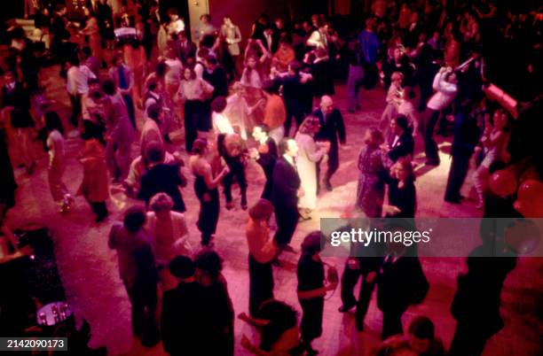 An above angle of people dancing at the Manhattan nightclub and disco Studio 54 in New York, New York, circa 1979.