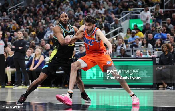 Chet Holmgren of the Oklahoma City Thunder and Isaiah Jackson of the Indiana Pacers battle for position in the second half at Gainbridge Fieldhouse...