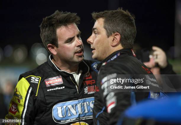 Timmy Hill, driver of the Coble Enterprises/UNITS Toyota, and Stewart Friesen, driver of the Aim Autism/Halmar Toyota, have a heated conversation on...