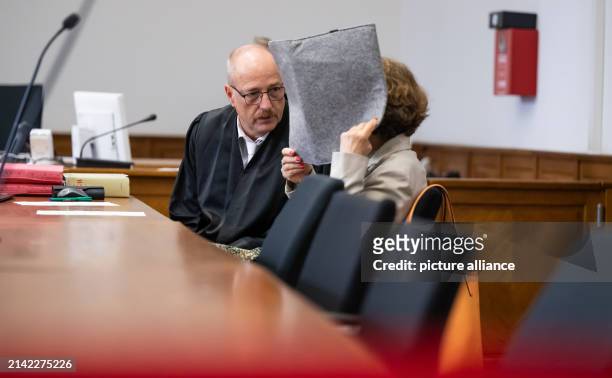 April 2024, Lower Saxony, Lüneburg: The defendant sits next to her defense lawyer Norbert Lösing in the district court. The trial against a...