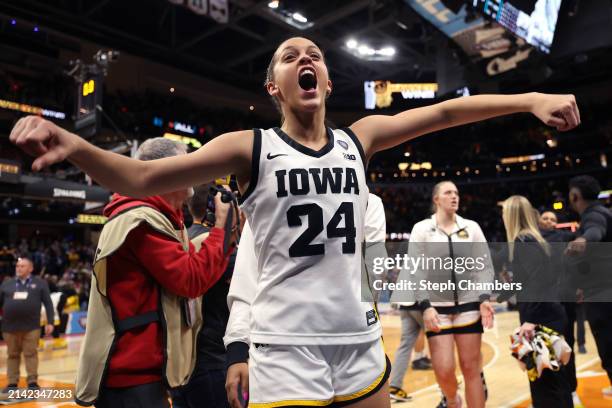Gabbie Marshall of the Iowa Hawkeyes celebrates after beating the UConn Huskies in the NCAA Women's Basketball Tournament Final Four semifinal game...