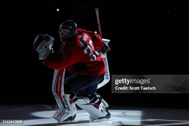 Darcy Kuemper of the Washington Capitals takes the ice before the game against the Carolina Hurricanes at Capital One Arena on March 22, 2024 in...