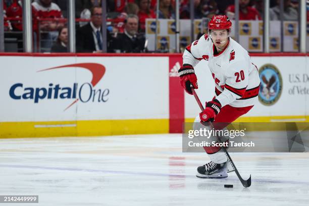 Sebastian Aho of the Carolina Hurricanes skates with the puck against the Washington Capitals during the first period of the game at Capital One...