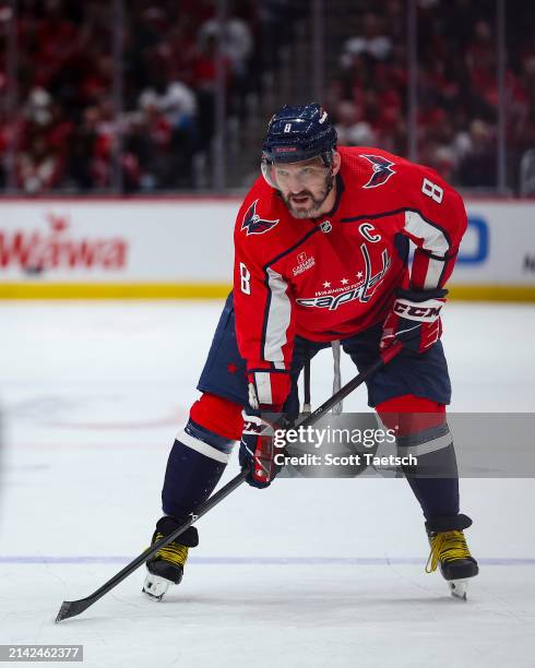 Alex Ovechkin of the Washington Capitals looks on against the Carolina Hurricanes during the second period of the game at Capital One Arena on March...