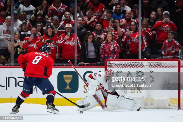 Alex Ovechkin of the Washington Capitals attempts to score against Pyotr Kochetkov of the Carolina Hurricanes during the shootout of the game at...