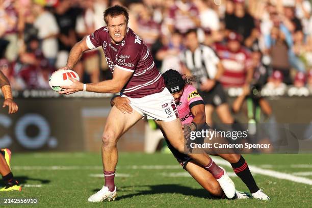 Jake Trbojevic of the Sea Eagles looks to pass a he is tackled during the round five NRL match between Manly Sea Eagles and Penrith Panthers at 4...