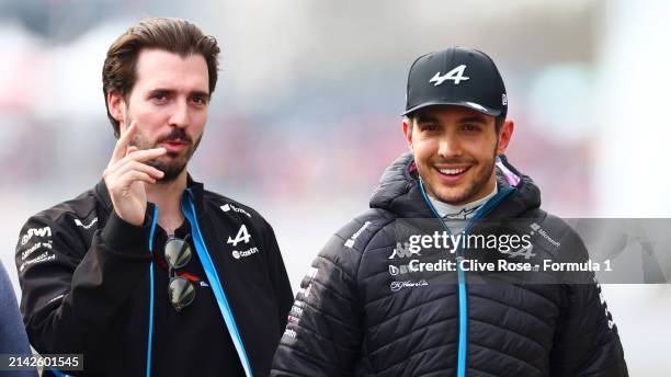 15th placed qualifier Esteban Ocon of France and Alpine F1 walks in the Paddock during qualifying ahead of the F1 Grand Prix of Japan at Suzuka...