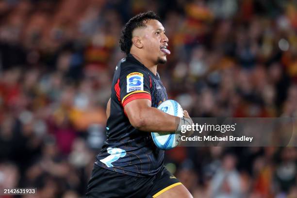 Sione Ahio of the Chiefs celebrates after scoring a try during the round seven Super Rugby Pacific match between Chiefs and Moana Pasifika at FMG...
