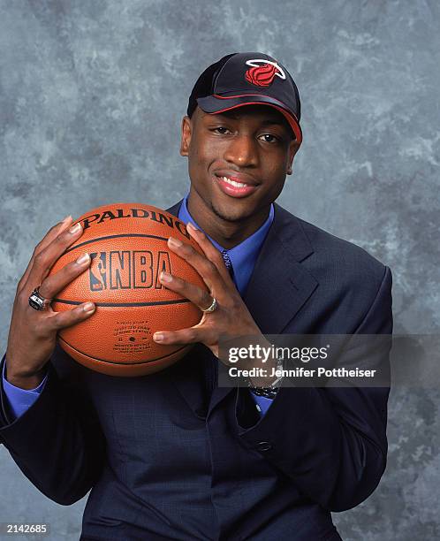 Dwyane Wade of the Miami Heat poses during the 2003/2004 NBA Draft Portrait at the Paramount Theatre at Madison Square Garden on June 26, 2003 in New...