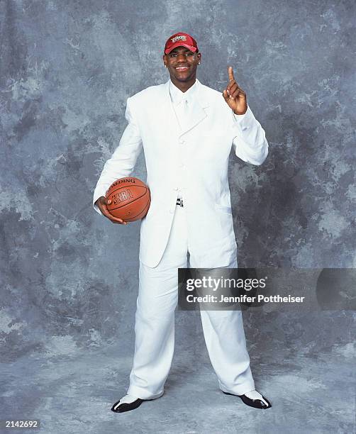 LeBron James of the Cleveland Cavaliers poses during the 2003/2004 NBA Draft Portrait at Paramount Theatre Madison Square Garden on June 26, 2003 in...