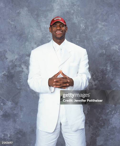 LeBron James of the Cleveland Cavaliers poses during the 2003/2004 NBA Draft Portrait at Paramount Theatre Madison Square Garden on June 26, 2003 in...