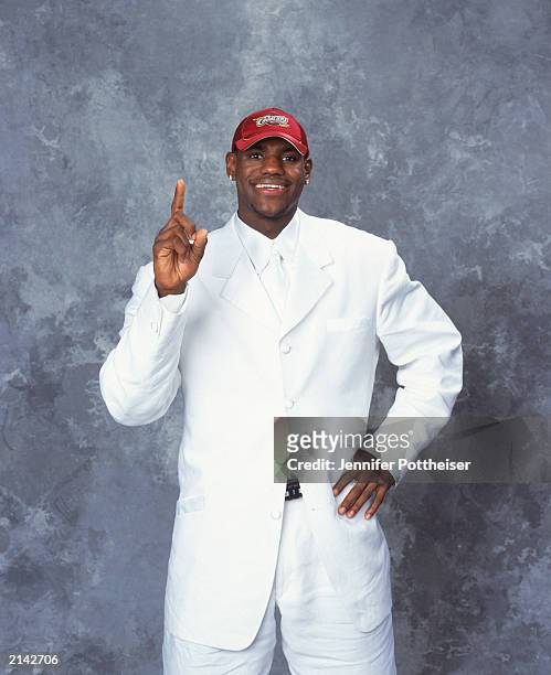 LeBron James of the Cleveland Cavaliers poses during the 2003/2004 NBA Draft Portrait at Paramount Theatre Madison Square Garden on June 26, 2003 in...