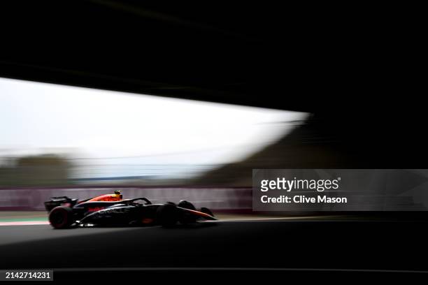 Sergio Perez of Mexico driving the Oracle Red Bull Racing RB20 on track during final practice ahead of the F1 Grand Prix of Japan at Suzuka...