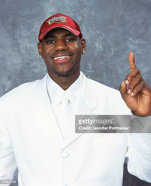 LeBron James of the Cleveland Cavaliers poses during the 2003/2004 NBA Draft Portrait at Paramount Theatre Madison Square Garden on June 26, 2003 in...