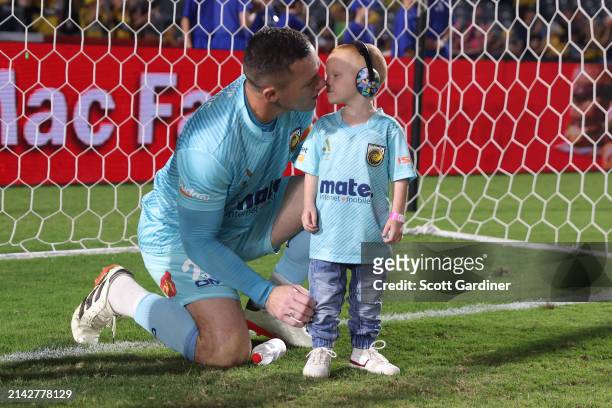 Danny Vukovic of the Mariners celebrates with his son post game during the A-League Men round 23 match between Central Coast Mariners and Wellington...