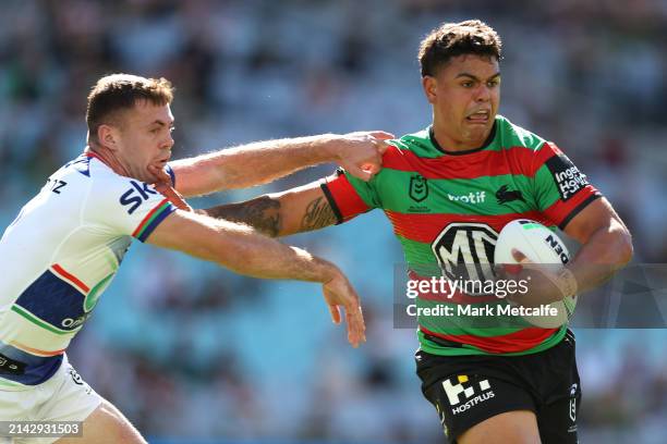 Latrell Mitchell of the Rabbitohs is tackled during the round five NRL match between South Sydney Rabbitohs and New Zealand Warriors at Accor...