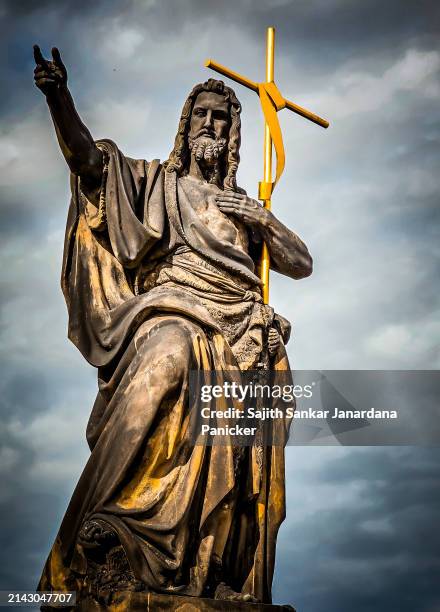 St John The Baptist Statue On The Charles Bridge In Prague Czech