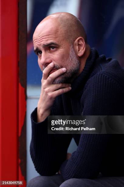 Pep Guardiola, Manager of Manchester City, looks on prior to the Premier League match between Crystal Palace and Manchester City at Selhurst Park on...