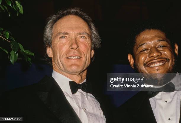 American actor and film director Clint Eastwood and American actor Forest Whitaker, both wearing tuxedos and bow ties, attend the 21st Annual NAACP...