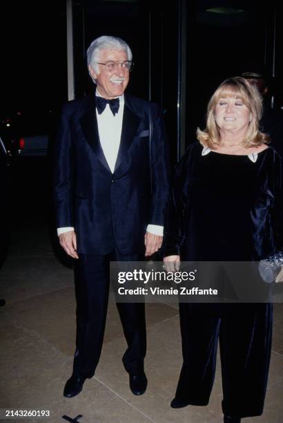 American actor and comedian Dick Van Dyke, wearing a tuxedo and bow tie, and American actress Michelle Triola attend the 10th American Cinema Awards,...