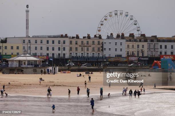 Members of the public enjoy the beach on April 06, 2024 in Margate, United Kingdom. Winds of 70mph may hit Cornwall, Wales and the northwest over the...