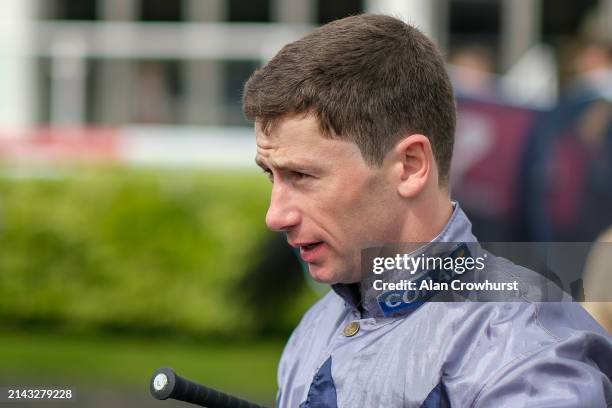 Oisin Murphy enters the parade ring at Kempton Park Racecourse on April 06, 2024 in Sunbury, England.