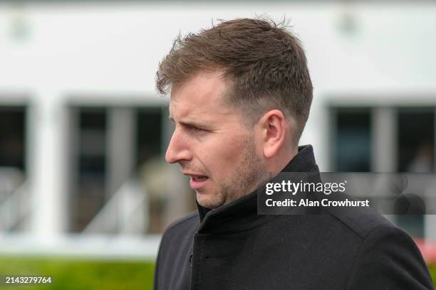 Jack Channon poses at Kempton Park Racecourse on April 06, 2024 in Sunbury, England.