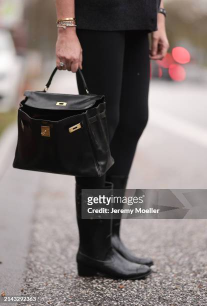 Yasmin von Schlieffen-Nannen seen wearing Lululemon black legging pants, Hermès Kelly black leather bag and Chanel black rubber boots on April 05,...